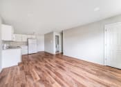 Thumbnail 11 of 27 - Kitchen and living room at Amity Senior, Amityville