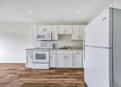 Thumbnail 2 of 27 - Kitchen with appliances at Amity Senior, Amityville, NY 11701