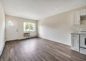 Thumbnail 19 of 27 - Open kitchen and living room at Amity Senior, Amityville, NY 11701