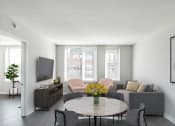 Thumbnail 2 of 20 - a living room with a table and chairs and a geometric ceiling at 34 Berry, Brooklyn, New York