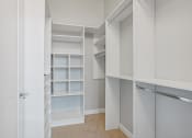 Thumbnail 10 of 26 - a large walk in closet with shelves and a door at 1919 Market St., Philadelphia, PA, 19103