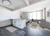 Thumbnail 5 of 20 - a living room with a kitchen and a couch at 34 Berry, Brooklyn, 11249