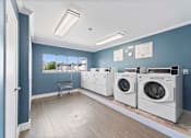 Thumbnail 18 of 19 - Laundry Room at Hendrix Apartments, Escondido, 92026