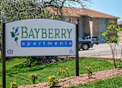 Thumbnail 20 of 25 - A sign for Bayberry Apartments is shown in front of a building.