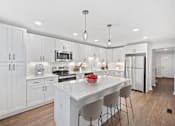 Thumbnail 7 of 54 - a large white kitchen with a white counter top at Indian Creek Apartments*, Cincinnati, Ohio