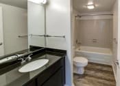 Thumbnail 41 of 46 - Bathroom with a sink and a toilet and a shower at Gramercy on Garfield, Cincinnati