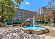 Thumbnail 45 of 46 - Fountain in the middle of a park with buildings in the background at Gramercy on Garfield, Cincinnati, Ohio