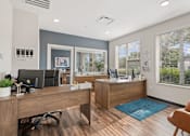 Thumbnail 5 of 42 - an office with two desks and a chair at DeSales Flats Apartments*, Cincinnati