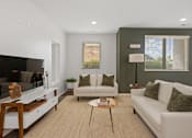 Thumbnail 11 of 42 - a living room with two white couches and a coffee table at DeSales Flats Apartments*, Cincinnati, 45206