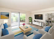 Thumbnail 5 of 32 - a living room with blue and white furniture and a television at Olde Towne in Kenwood, Cincinnati, 45243