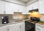 Thumbnail 14 of 16 - Kitchen with white cabinetry at Rivers at Bluegrass, Kentucky, 40503