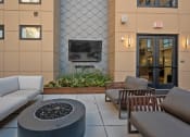 Thumbnail 70 of 81 - a lounge area with couches and chairs and a fire pit at Four23/Hoge, Ohio