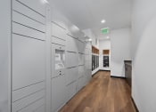 Thumbnail 57 of 81 - a long white storage room with white cabinets and a wood floor at Four23/Hoge, Cincinnati, OH, 45226