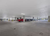 Thumbnail 62 of 81 - an empty parking garage with cars parked in it at Four23/Hoge, Cincinnati, OH