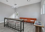 Thumbnail 52 of 57 - a bar area in a room with a table and chairs at Indian Lookout Apartments, West Carrollton