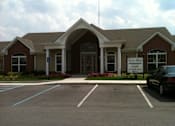 Thumbnail 19 of 21 - A building with a sign that says Forest Ridge on it.
