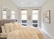 Thumbnail 19 of 81 - Bedroom with grey walls and a large bed at Four23/Hoge, Cincinnati, OH, 45226