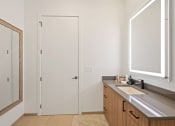 Thumbnail 37 of 81 - Bathroom with a sink and a mirror at Four23/Hoge, Ohio