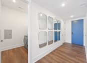 Thumbnail 22 of 81 - Laundry room with white walls and a blue door at Four23/Hoge, Ohio