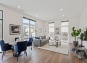 Thumbnail 26 of 81 - Living and dining room area with white walls and hardwood floors at Four23/Hoge, Cincinnati, OH