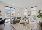 Thumbnail 28 of 81 - Living room with white walls and hardwood floors at Four23/Hoge, Cincinnati, 45226