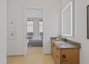 Thumbnail 36 of 81 - Bathroom with a sink and mirror in a 555 waverly unit at Four23/Hoge, Cincinnati
