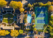 Thumbnail 45 of 54 - Tennis Court and Pool Aerial View at Indian Creek Apartments, 45236