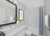 Thumbnail 6 of 54 - a white bathroom with a large mirror and a tub and a sink at Indian Creek Apartments*, Cincinnati, OH
