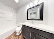 Thumbnail 17 of 35 - a bathroom with a toilet sink and bathtub at Lawrence Landing, Indiana, 46226