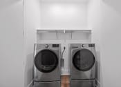 Thumbnail 8 of 81 - two washing machines in a white laundry room at Four23/Hoge, Ohio