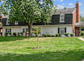 Thumbnail 28 of 32 - a white house with a tree in the front yard at Olde Towne in Kenwood, Ohio