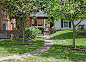 Thumbnail 27 of 32 - a sidewalk in front of a brick house at Olde Towne in Kenwood, Cincinnati
