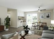 Thumbnail 4 of 33 - A living room with a television, a dining table, and a ceiling fan at A62 Apartments, Indiana