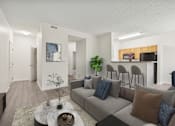 Thumbnail 1 of 54 - A living room with a grey couch and a coffee table.