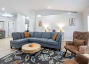 Thumbnail 1 of 16 - Grey couch and brown chairs at Rivers at Bluegrass, Lexington, KY, 40503