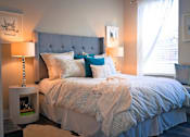 Thumbnail 26 of 42 - a bedroom with a bed and a window at DeSales Flats Apartments*, Ohio, 45206