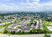 Thumbnail 39 of 40 - A suburban neighborhood with a mix of detached and semi-detached houses.