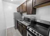 Thumbnail 29 of 34 - Kitchen at Woodlee Terrace Apartments, Woodbridge