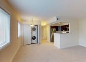 Thumbnail 14 of 34 - Kitchen With Laundry Area at Woodlee Terrace Apartments, Virginia, 22192