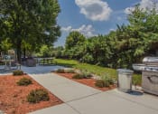 Thumbnail 21 of 34 - BBQ and eating area outdoor at Woodlee Terrace Apartments, Woodbridge, 22192