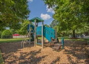 Thumbnail 22 of 34 - Playground structure with play area at Woodlee Terrace Apartments, Woodbridge