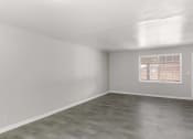 Thumbnail 20 of 69 - the living room of an apartment and white walls and a window
