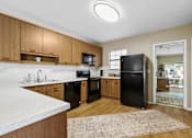 Thumbnail 7 of 53 - kitchen with black appliances