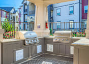 Thumbnail 23 of 38 - outdoor BBQ grill area on a patio