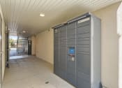 Thumbnail 18 of 20 - the front door of an apartment building with a locking door