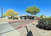 Thumbnail 2 of 18 - A sunny day at the CalCap building with a clear blue sky.