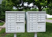 Thumbnail 14 of 18 - Two mailboxes with numbers 1 to 12 on them.