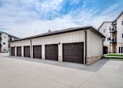 Thumbnail 30 of 35 - A large garage with the number 60 on it.