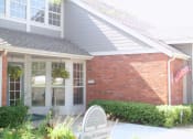 Thumbnail 2 of 3 - Northpark Apartments clubhouse with large windows and inviting architecture.