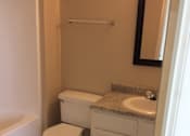 Thumbnail 13 of 15 - Lower bathroom in the Yeakel Townhome, featuring functional fixtures and a clean design.